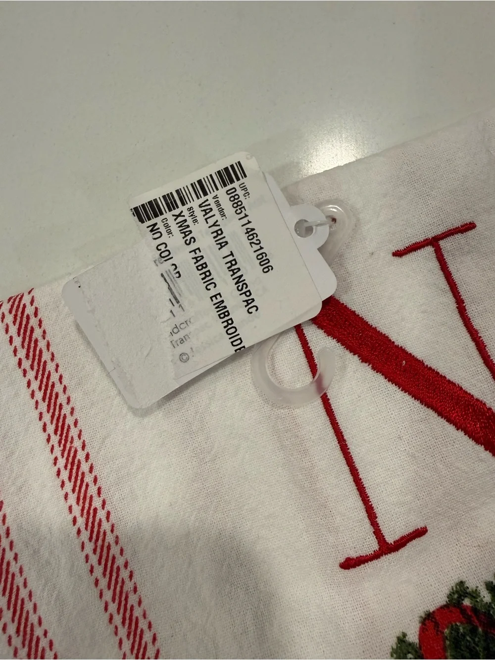Christmas Wreath tea towel with red embroidered 